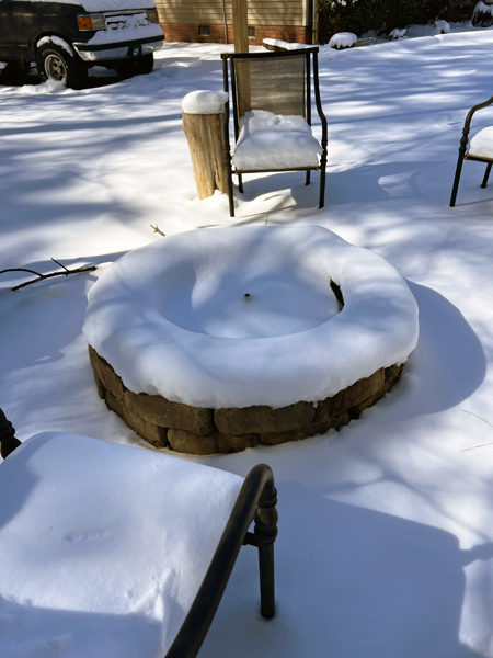 snow coverd fireplace