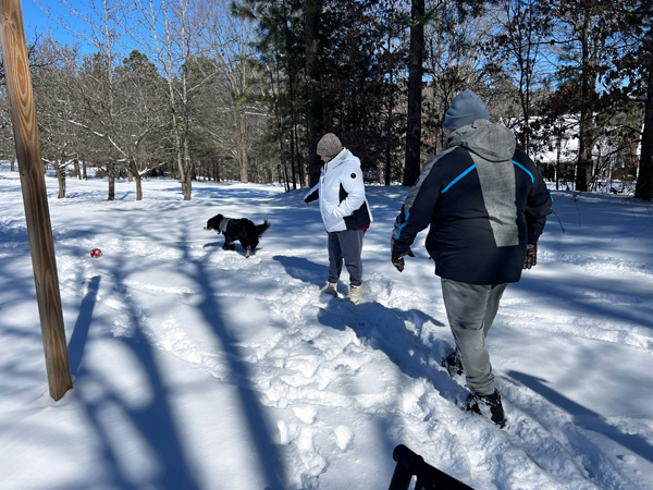 family in snow