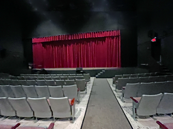 Looking at the stage and theater seats