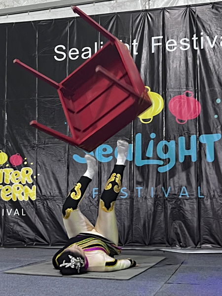 erfomer twirled a desk around and around 