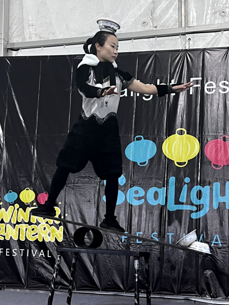 popping bowls from the plant to her head