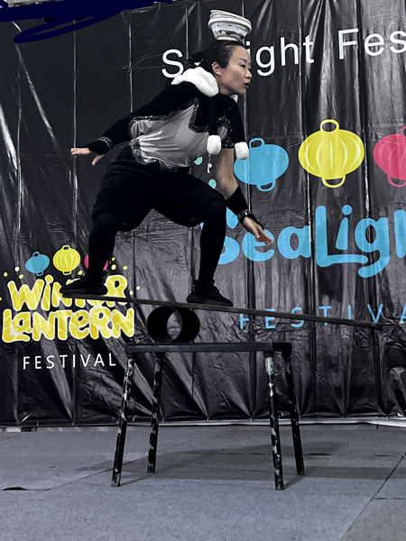 popping bowls from the plant to her head