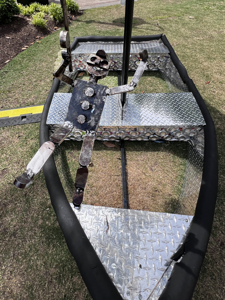 man hanging from the fish