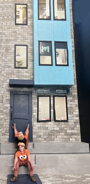 Karen Duquette walking on the building