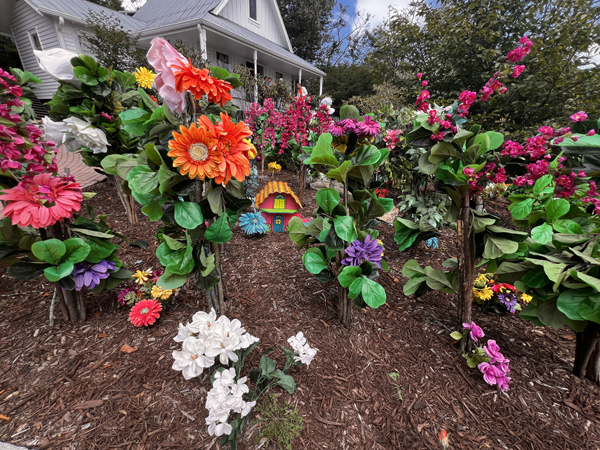 flowers and a small house