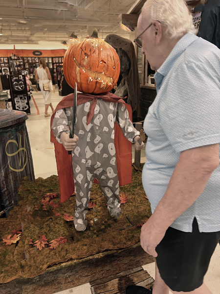 Lee Duquette and a pumpkin head