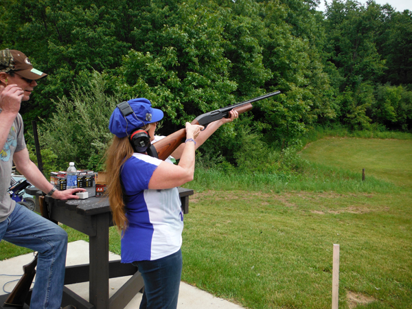 Karen Duquette shooting at the clay pigeons