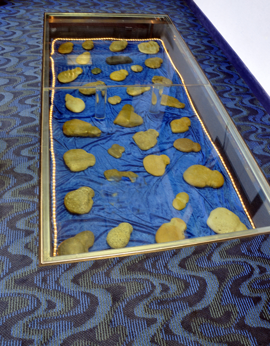 rocks in a box filled with water 