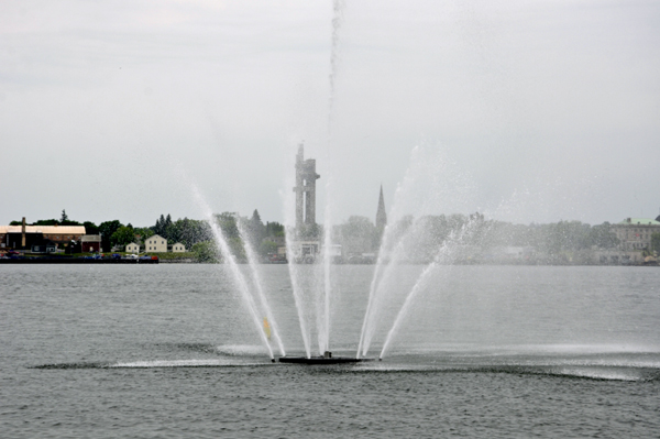 a water fountain and the Tower of History in USA