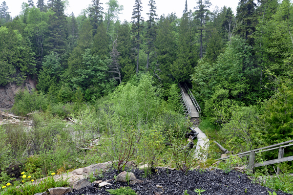 the pathway and stairs to the right of the falls