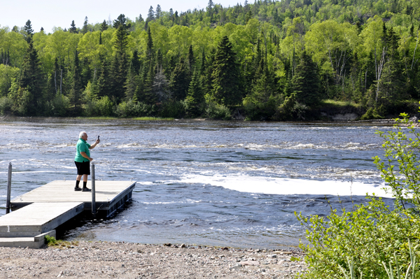 Lee Duquette taking photos of Hays Lake Dam 