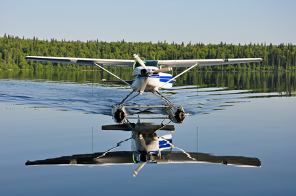 floatplane reflected in the lake