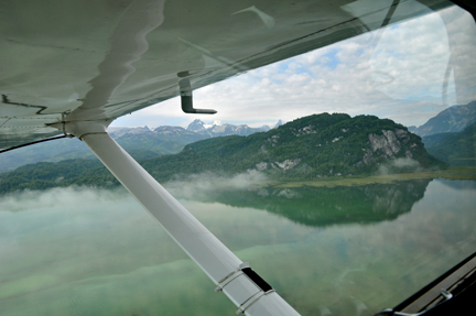 scenery taken out the closed window of the floatplane