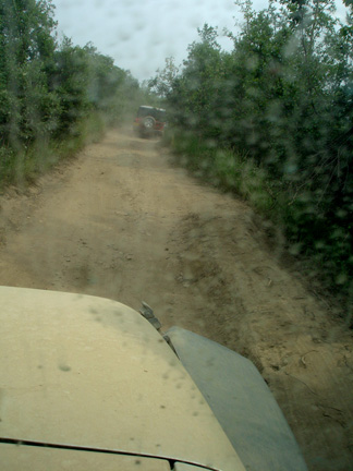 dust and mud on the window of jeep