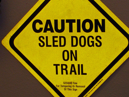sign - caution - sled dogs on trail