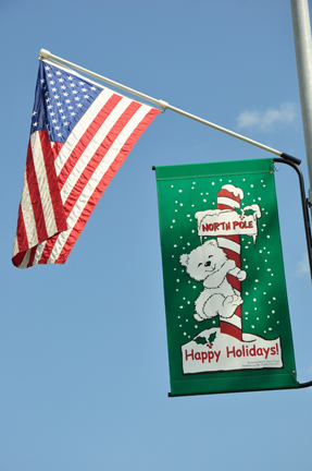 USA flag and Happy Holidays sign