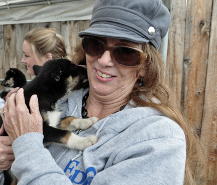 Karen Duquette and  a future sled dog