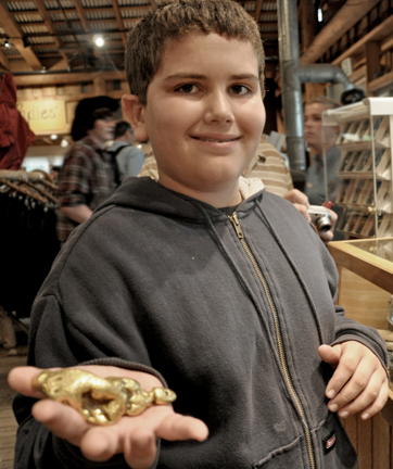 Alex holding a 19 ounce nugget