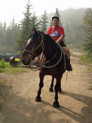 Lee Duuqette rides the horse in Alaska