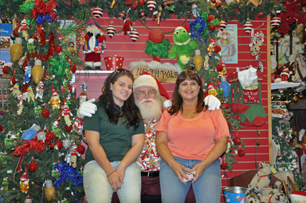 Mother and daughter with Santa