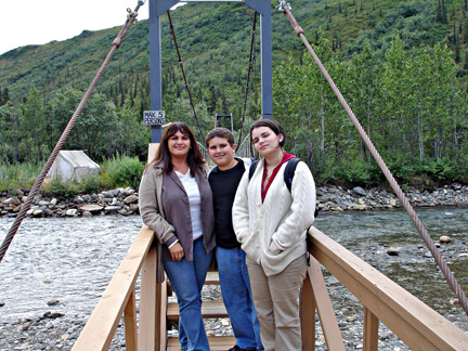 the family crossing the bridge