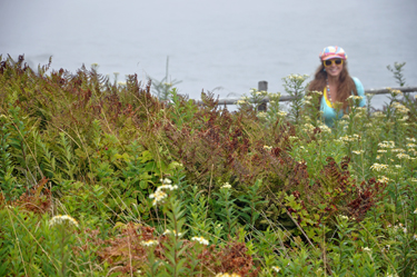 Karen Duquette in a field of flowers