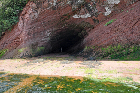 close-up of the cave in the sandstone cliff