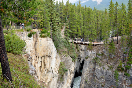 people on the upper cliff