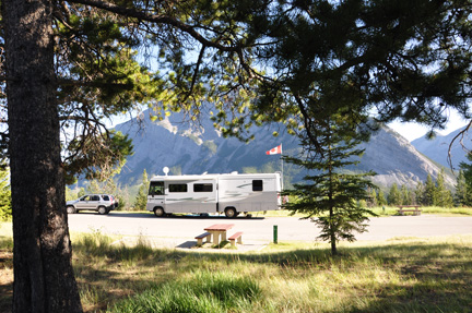 view from campsite of another RV