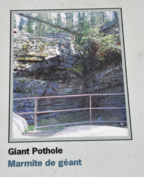 sign - giant pothole