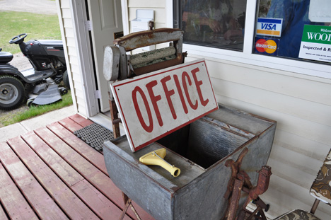 Office sign and old wringer washer