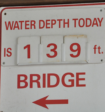 sign - river depth today is 139 feet