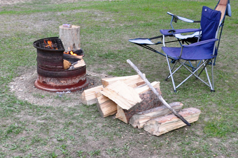 chairs and campfire ready for friends
