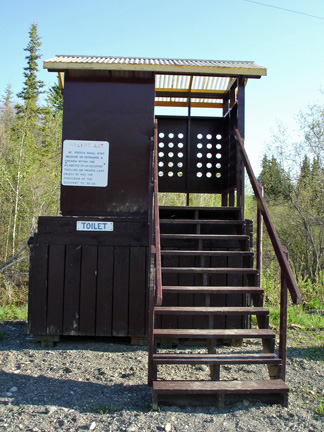 a raised outhouse