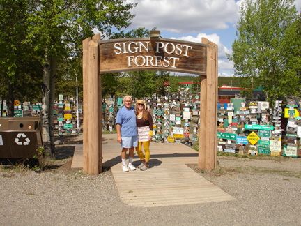 Lee and Karen Duquette at the entry to Sign Post Forest