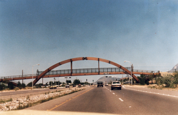 wooden bridge and arch for pedestrians