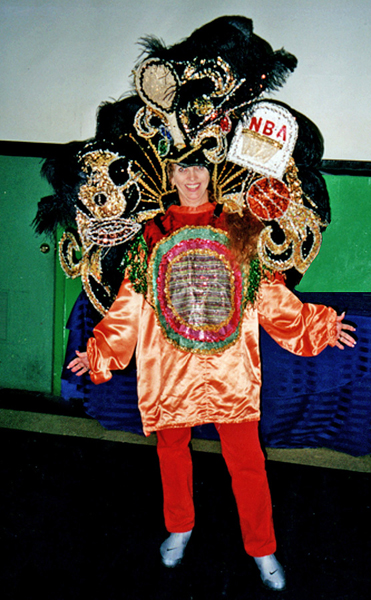 Karen Duquette in a Mardi Gras World costume