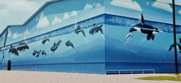 A building in the marina with painted dolphins