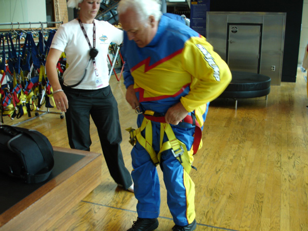 Lee Duquette getting in his jump suit