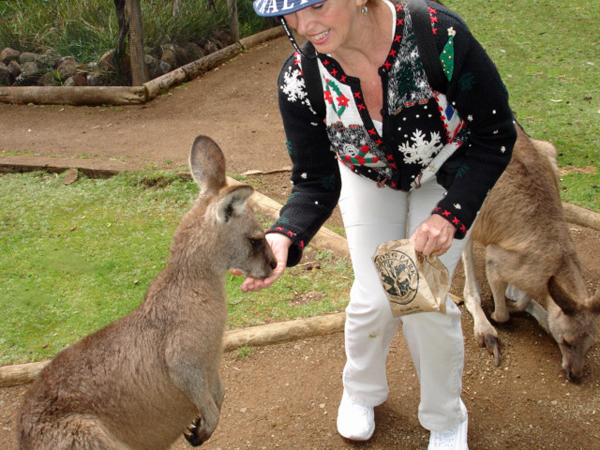 Karen  feeding a kangaroo