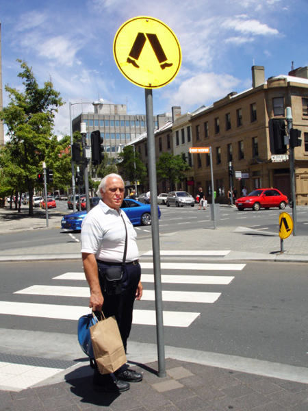Lee  Duquette at a crossing sign