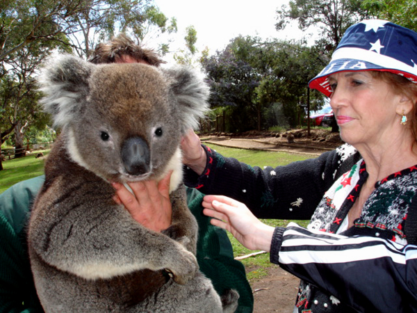 Karen Duquette petting a koala