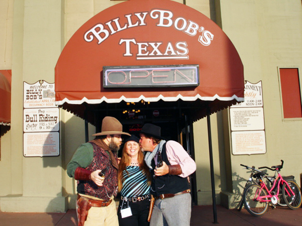 Karen Duquette got kissed by two cowboys as she entered Billy Bob's