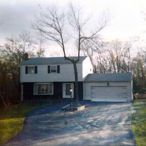 Terryville house with a driveway