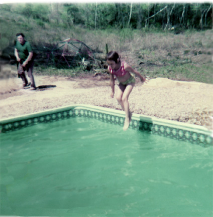 Renee Duquette jumping into the pool