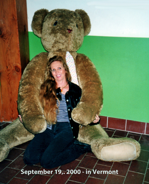 Karen Duquette and a giant teddy bear