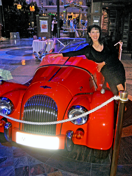 AMY TINOCO and a car on display