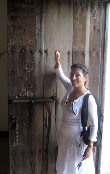 Amy Tinoco knocking on a door