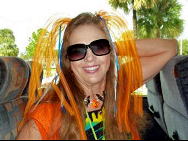 Karen Duquette and her flashy headpiece