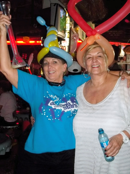 Karen Duquette and friend with balloon heads